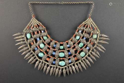 ethnic necklace with bigger beads of turquoise and…