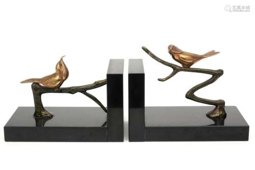 pair of Art Deco book-ends in marble each with a b…