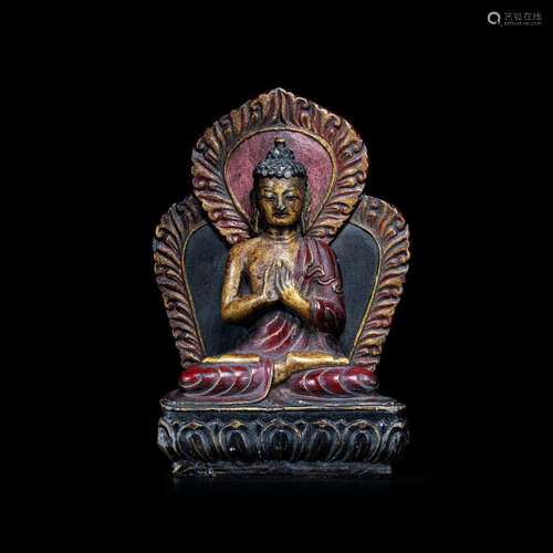 Painted in mud and gold Stone Buddha statue