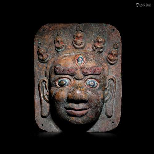 Mud and gold painted masks from Tibet