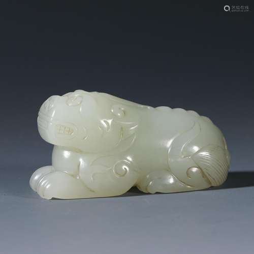 Hetian jade auspicious animal handle piece from the Qing dyn...