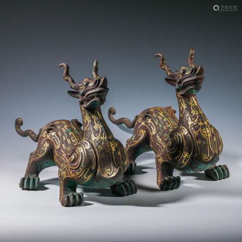 A pair of golden beasts from the Qing Dynasty