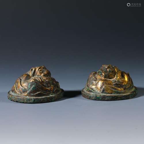 A pair of gilt copper paper town from the Qing Dynasty