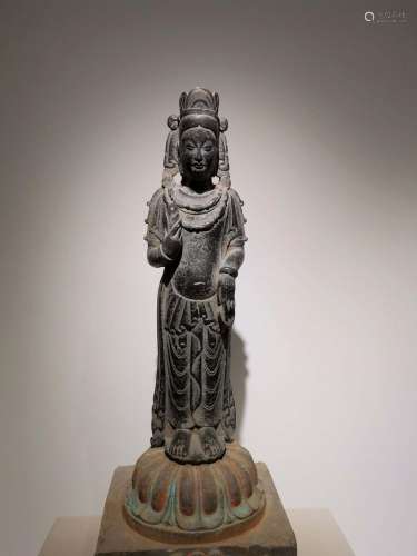 A CARVED CREY STONE STANDING BUDDHA .NORTHERN QI PERIOD
