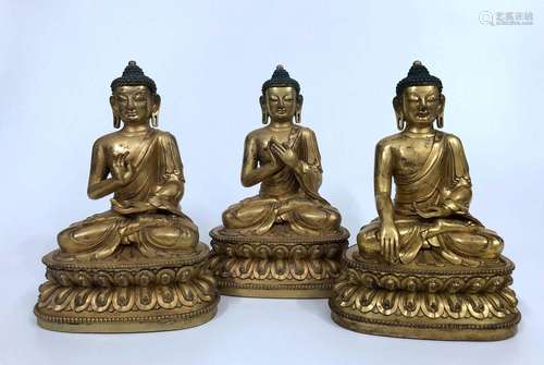 THREE OF GILT-BRONZE FIGURE OF SHAKYAMUNIS