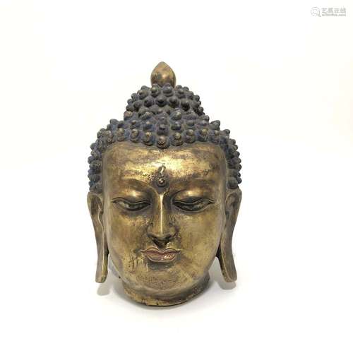 A GILT-BRONZE BUDDHA HEAD