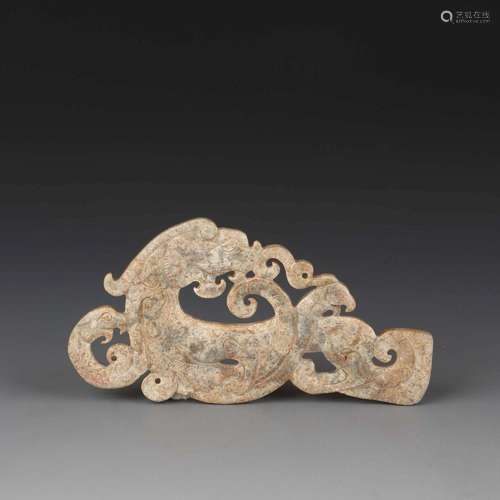 A CARVED JADE 'DRAGON' PENDANT.HAN DYNASTY