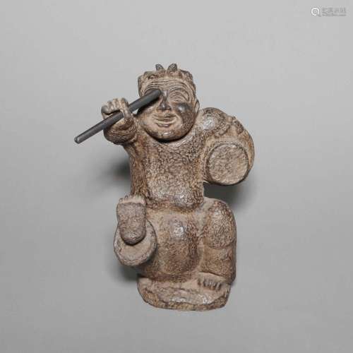 A CARVED STONE FIGURE.HAN DYNASTY