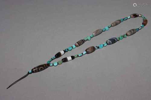 A TURQUOISE AND DZI BEADS NECKLACE