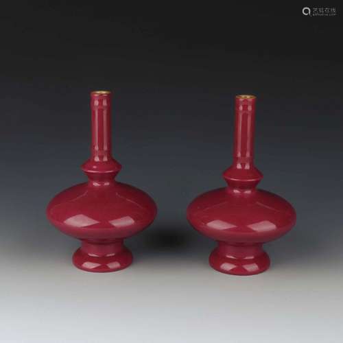 A PAIR OF RUBY-GLAZED VASES.MARK OF QIANLONG