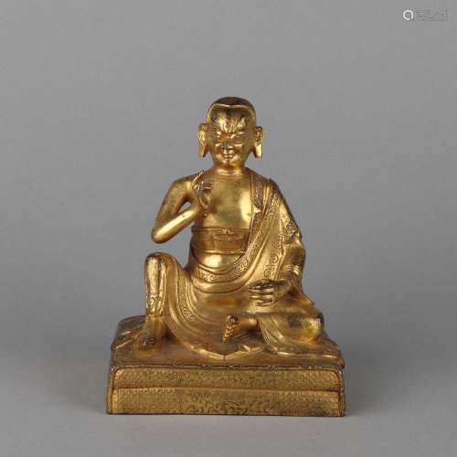 A GILT-BRONZE FIGURE OF LUOHAN.QING DYANSTY