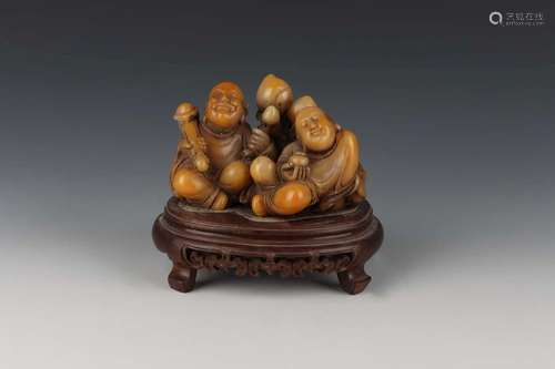 A CARVED SOAPSTONE LUOHAN GROUP