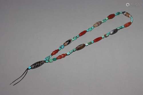 A TURQUOISE AMBER AND DZI BEADS NECKLACE