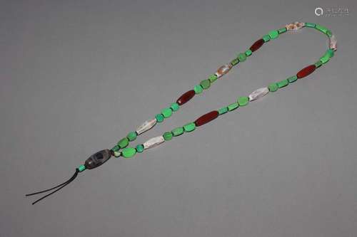 A TURQUOISE AND DZI BEADS NECKLACE