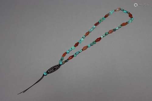 A TURQUOISE AND DZI BEADS NECKLACE