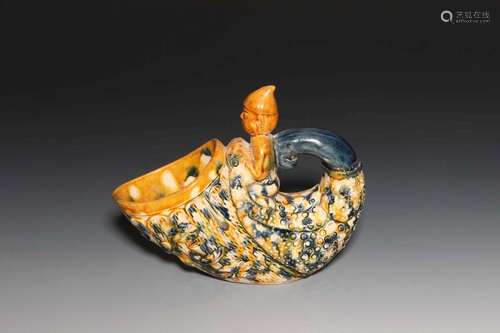 A SANCAI-GLAZED FIGURAL CUP.TANG DYNASTY