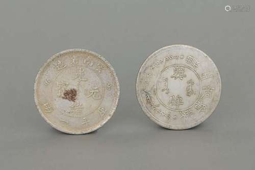 TWO SILVER COINS