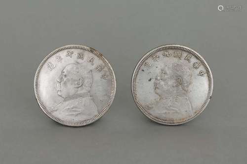 TWO SILVER COINS