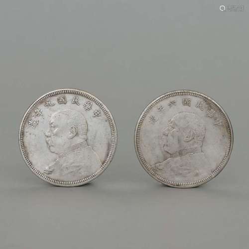 TWO SILVER COINS