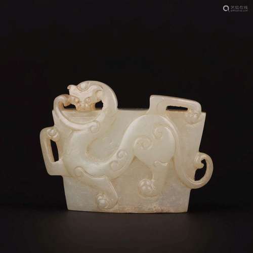 A WHITE JADE 'DRAGON' PENDANT.WARRING STATES PERIOD