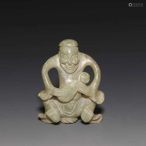 A CARVED WHITE JADE 'FIGURAL' PENDANT.WARRING STATES PERIOD