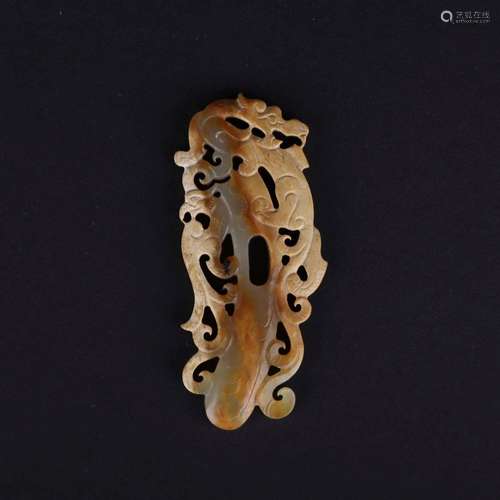 A CARVED WHITE JADE 'DRAGON' PENDANT.WARRING STATES PERIOD