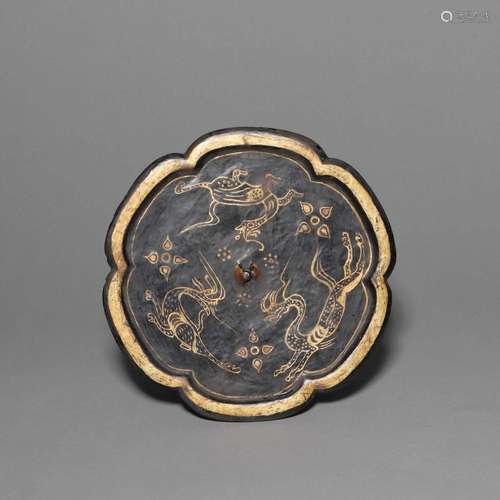 A GILT-BRONZE MIRROR.WARRING STATES PERIOD