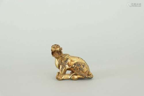 A GILT-BRONZE BEAST.WARRING STATES PERIOD