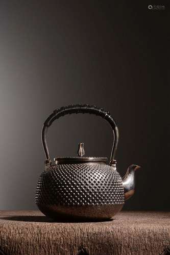 A JAPANESE TEAPOT AND COVER