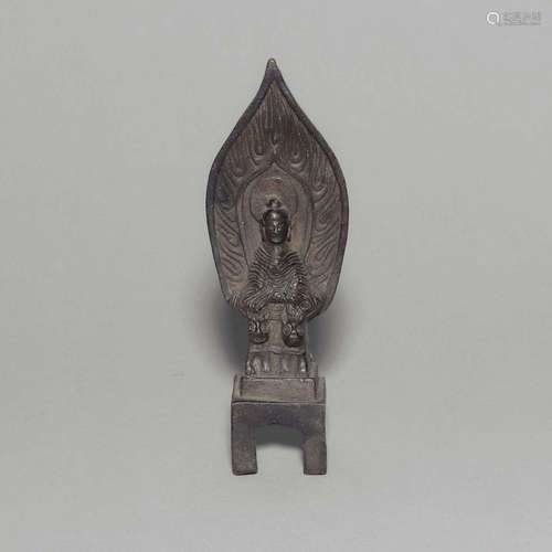 A BRONZE FIGURE OF SEATED SHAKYAMUNI.NORTHERN WEI PERIOD