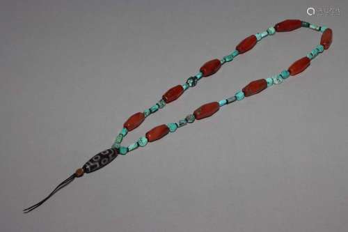 A TURQUOISE AND DZI BEADS NECKLACE