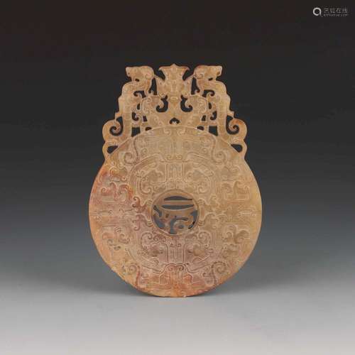 A CARVED JADE 'DRAGON'BI.WARRING STATES PERIOD