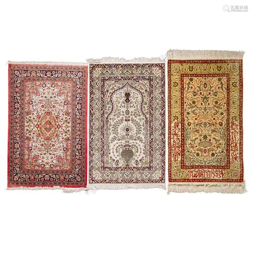 3 Oriental silk carpets. HEREKE: