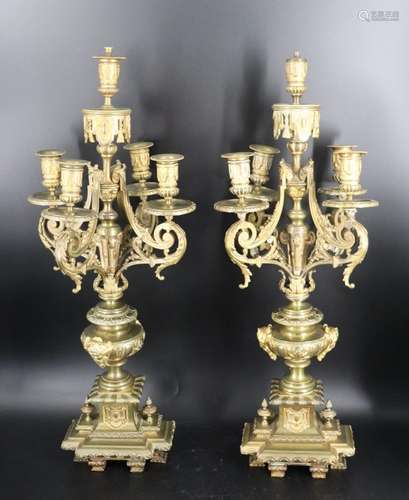 A Pair of Antique Bronze Candelabra.