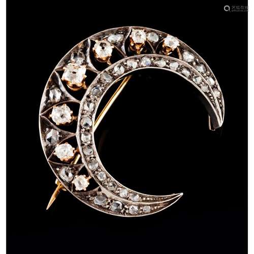 A crescent brooch