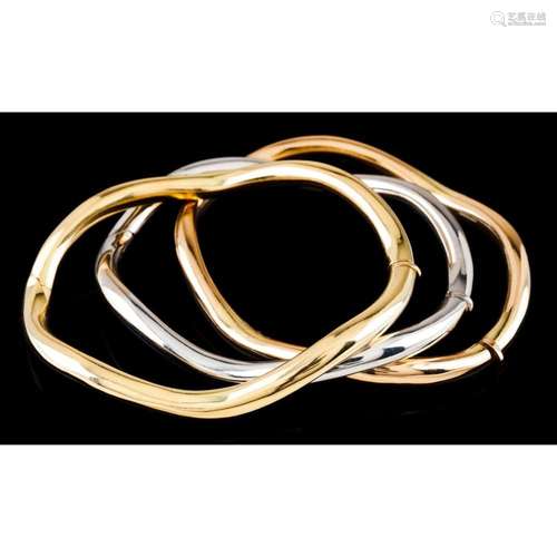 Three undulating bracelets