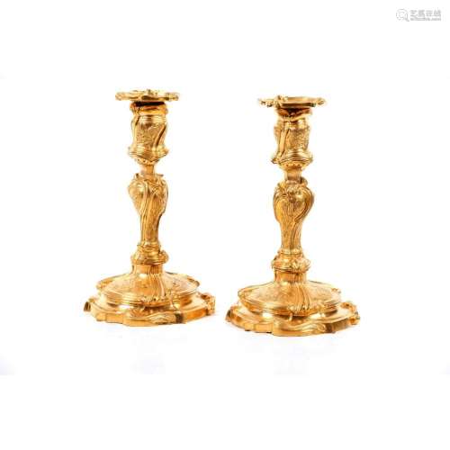 A pair of Louis XV style candlestands