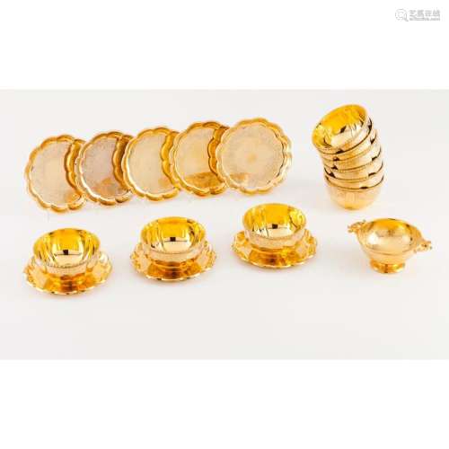 A group of nine fingerbowls, eight bread plates and a tall f...