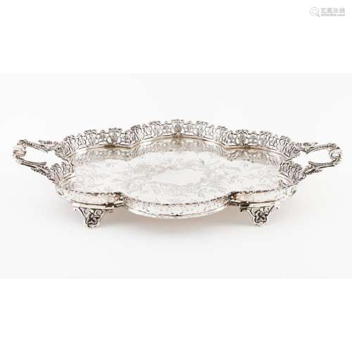 A four footed scalloped galleried tray