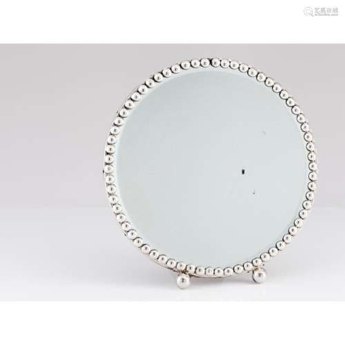 A round table top mirror