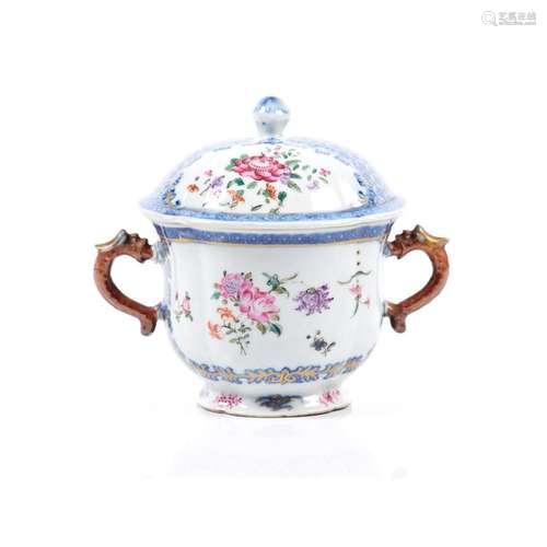 A sugar bowl and cover