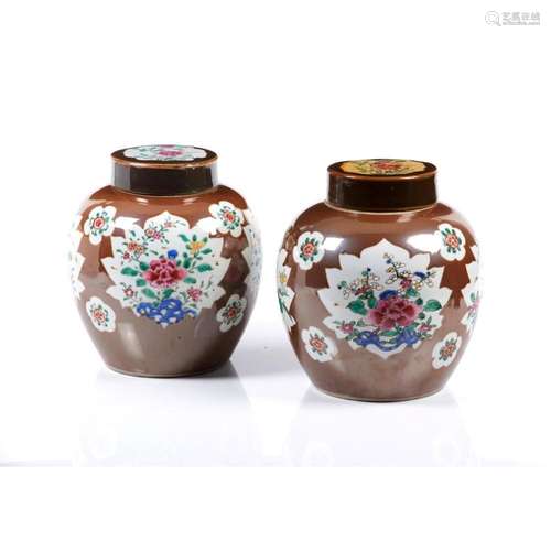 A pair of vases and covers