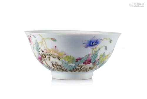 A Famille Rose porcelain bowl enamelled with flowers rocks a...