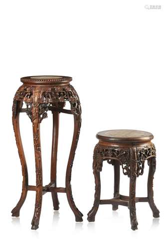 Two finely carved wood plant stands with marble top (defects...