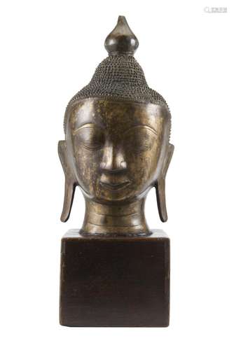 A parcel gilt bronze Buddha head Thailand