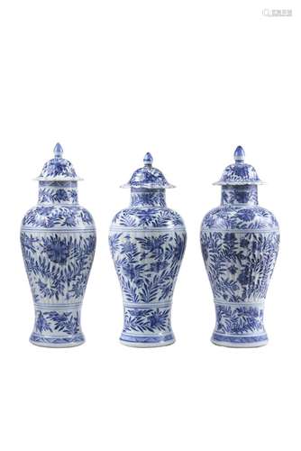 Three blue and white potiches decorated with flower motives ...