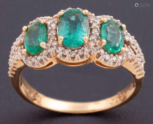 EMERALDS AND DIAMONDS RING IN 18KT YELLOW GOLD_.<br />
ring ...