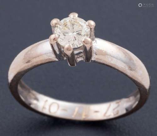 SOLITAIRE MADE IN 18 KT GOLD WITH A CENTRAL DIAMOND_.<br />
...