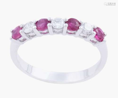 RING WITH DIAMONDS AND RUBIES IN GOLD 18 KT_.<br />
Made in ...