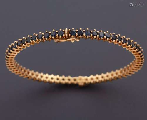 RIGID BRACELET MADE IN 18 KT GOLD WITH SAPPHIRES _<br />
rig...